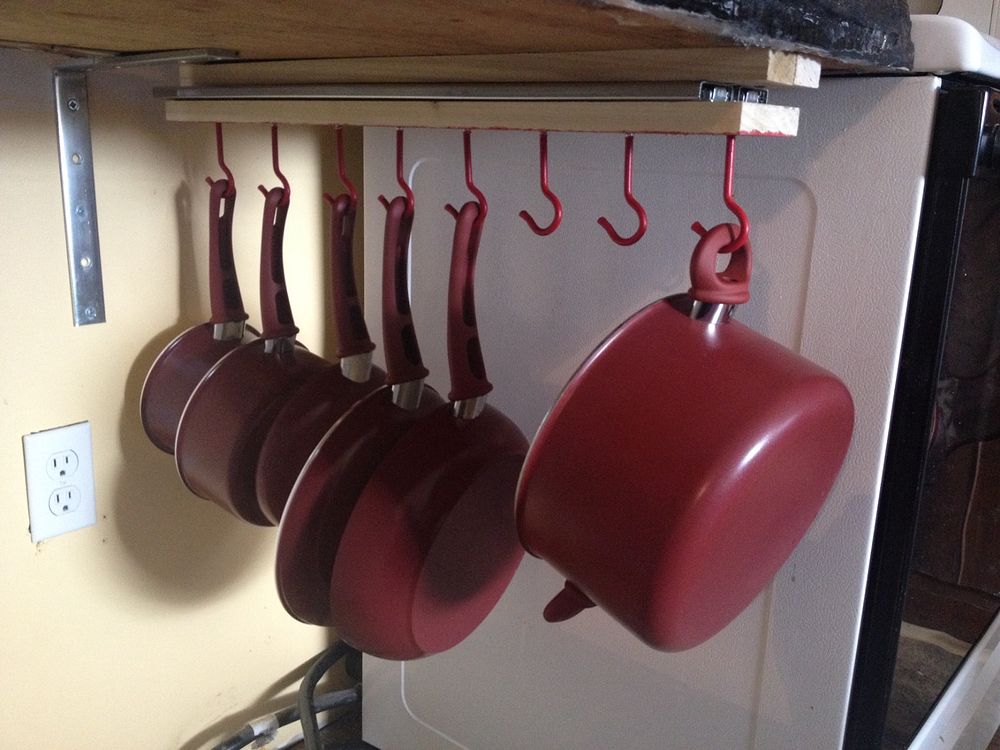 http://st.effectivehouse.com/upl/9/under-the-counter-pull-out-pots-and-pans-rack-countertops-diy-how-to1.jpg