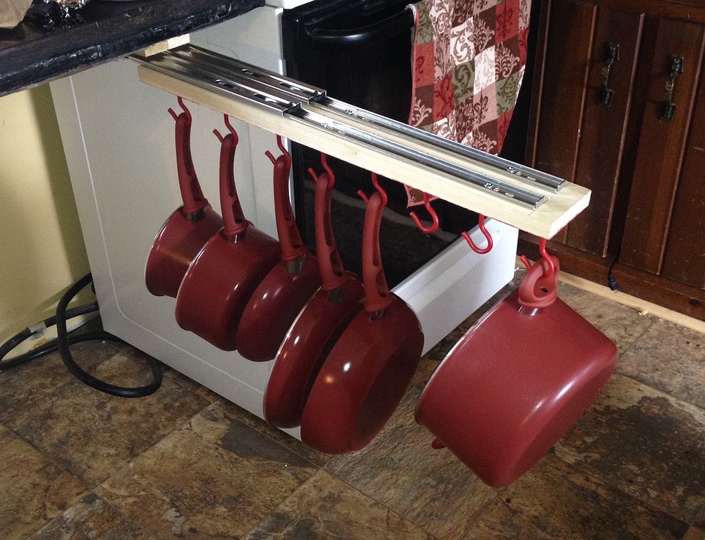 http://st.effectivehouse.com/upl/9/under-the-counter-pull-out-pots-and-pans-rack-countertops-diy-how-to2.jpg